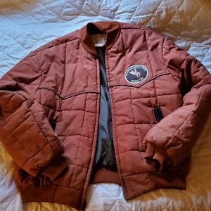 VINTAGE 1970's national rodeo finals puffer coat.